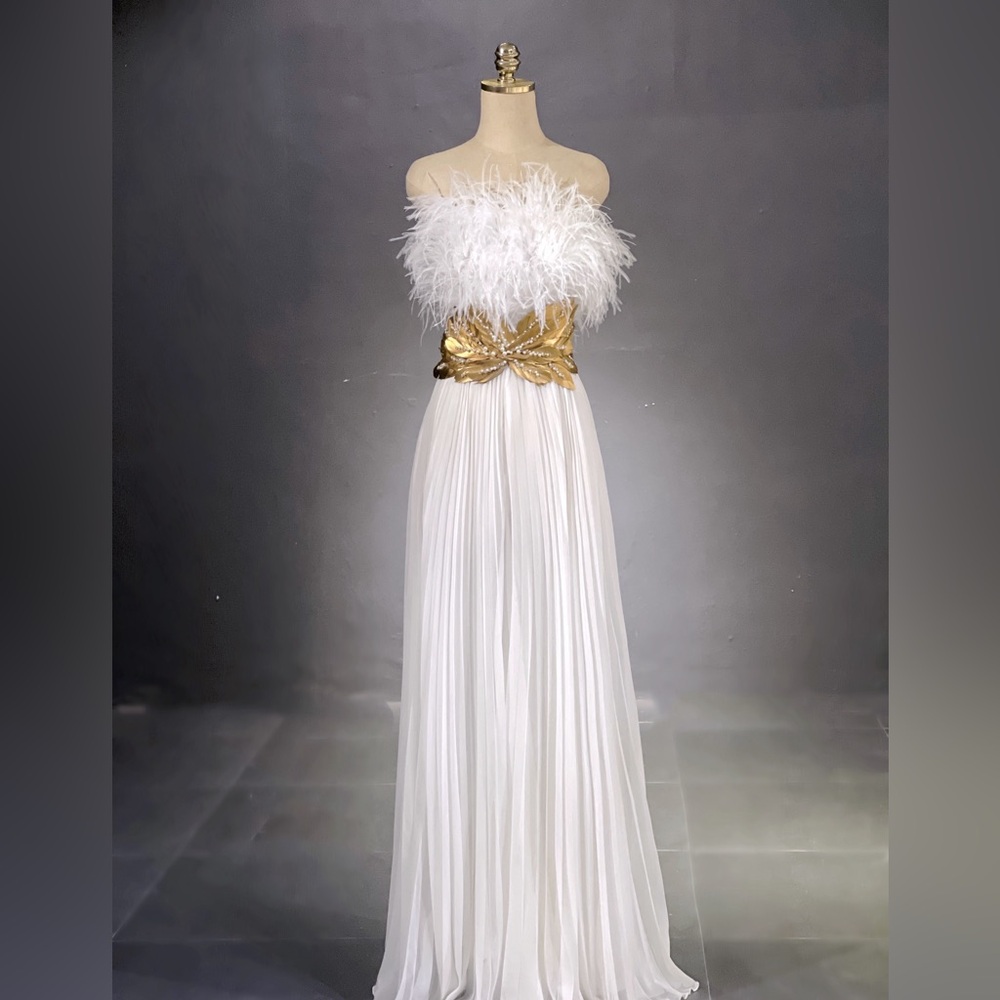 White party evening mini dress with a strapless design and chiffon fabric.